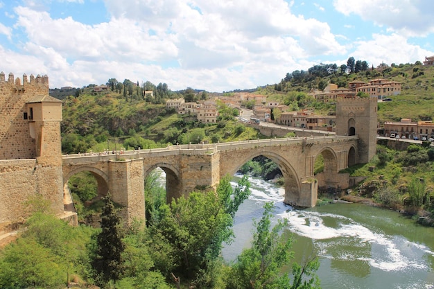 Old stone bridge over a river