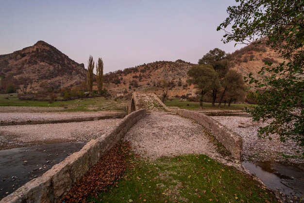 An old stone bridge spanning