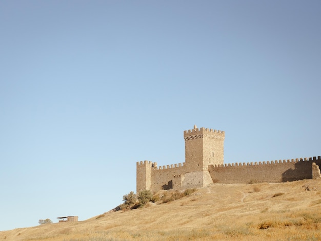 Old stone castle over the hills ancient fortress