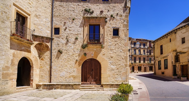 Old stone houses with arched doorways in the town of Castilla. Sepulveda