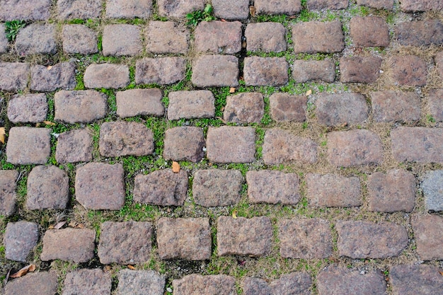 Old stone paving stones road surface