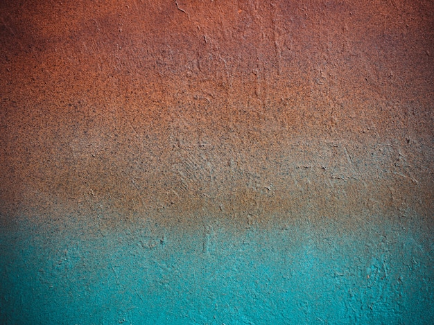 Old stone vintage multi-colored wall: orange, blue colors. 