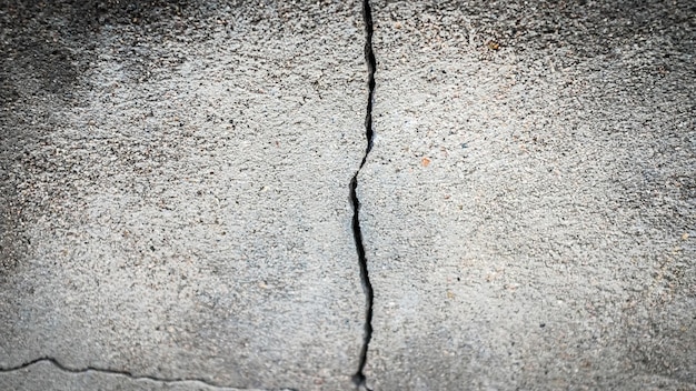 Old stone wall with a crack. texture for design