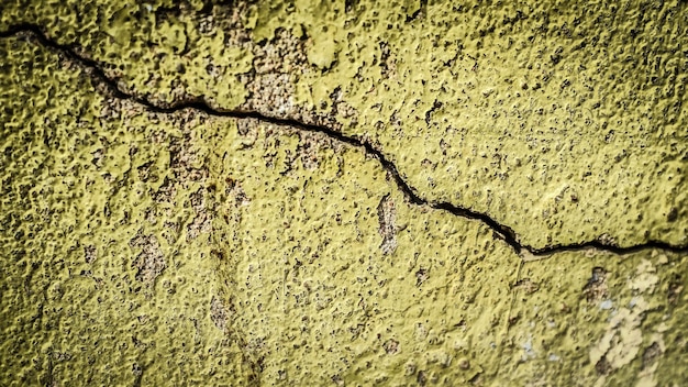 Old stone wall with a crack. texture for design