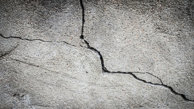 Old stone wall with a crack texture for design