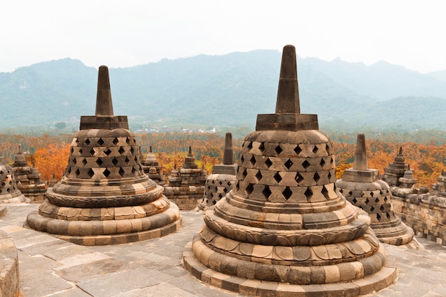 Old stupas in Borobudur Buddhist temple. Mahayana Buddhist temple in Java