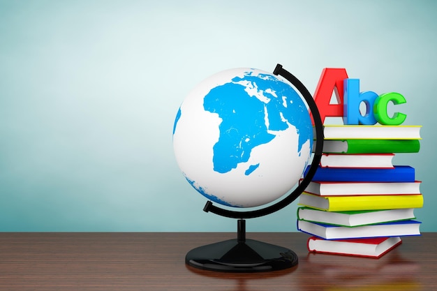 Old Style Photo. Books with ABC sign and World desktop globe on the table