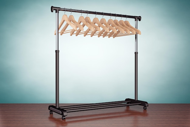 Old Style Photo. Mobile black coat rack with hangers on the table