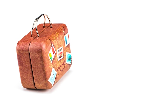 Photo old suitcase travel stickers isolated with a clipping path.