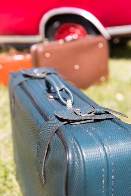 Old suitcases near the car