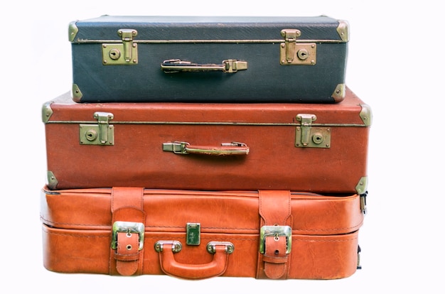 Old suitcases for travel isolated on white background