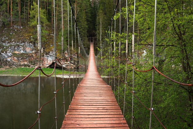 Old suspension bridge over the river