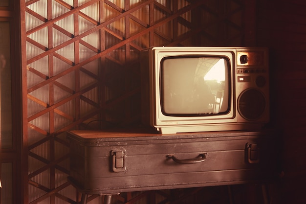 Old television on vintage table