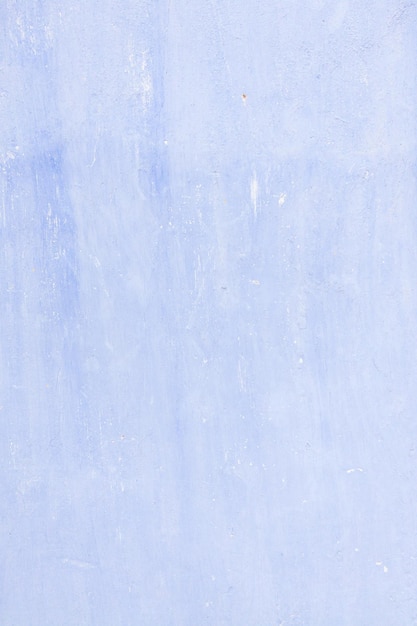 Старая текстура бирюзовый светло-голубой потрескавшаяся стена старая текстура краски трескается и трескается при падении разрушение Вертикальный формат