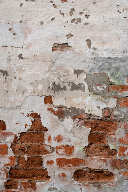 Old textured red brick background, surface of old broken texture, top view, copy space