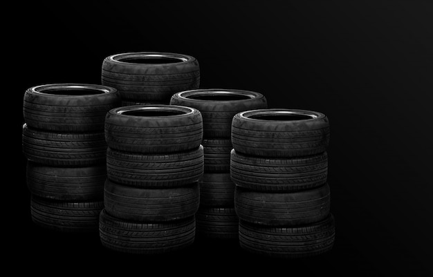 Old tires stacked, isolated on black 