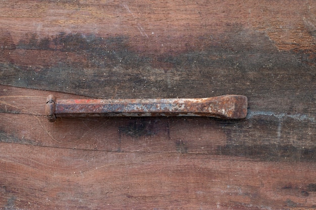 Old tools on wooden background