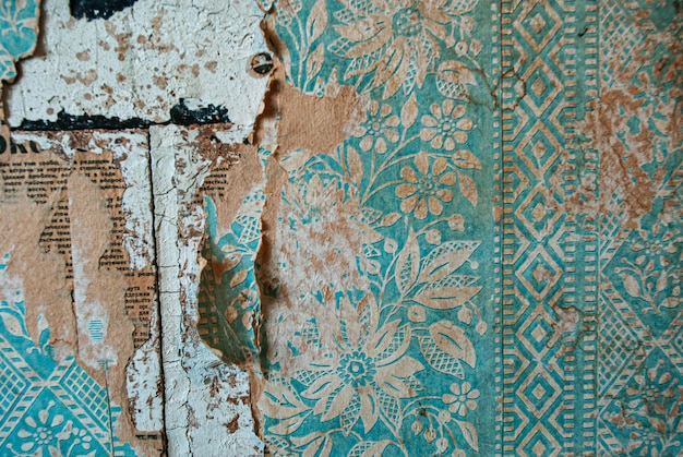 Old torn wallpaper of the eighties