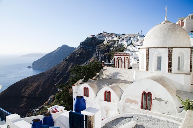 old town by coastline against sky