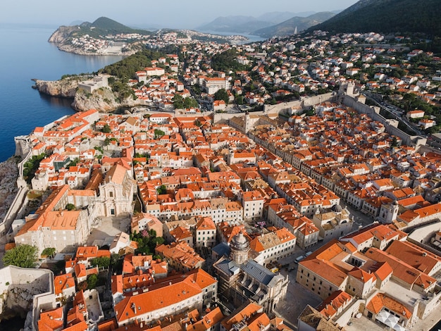 Old town of Dubrovnik with orange rooftops on Adriatic sea coast in Dalmatia region Croatia Aerial view from drone Popular summer destination