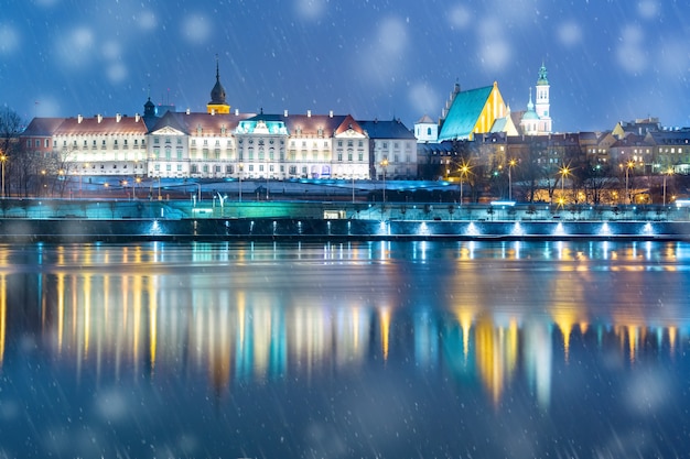 Old Town and river Vistula at night in Warsaw, Poland.