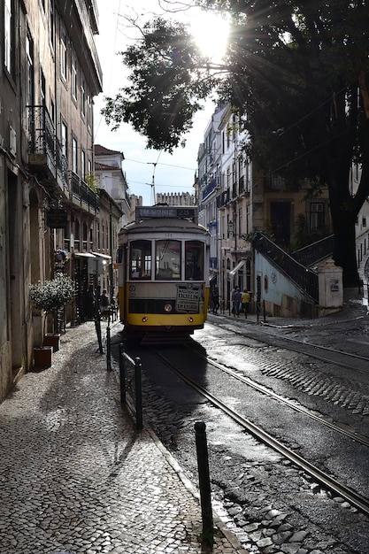 old tram on a narrow street in portugal