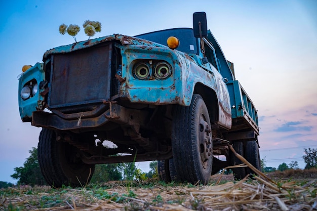 Photo old truck parked in rice fields in thailand