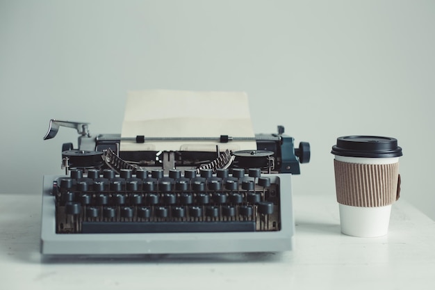 Old typewriter on the table with copyspace