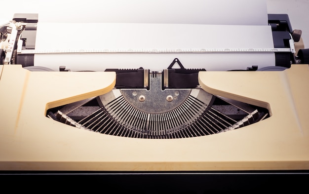 Old typewriter with paper