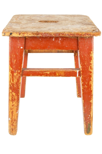 Old used wooden stool with brown peeling paint Loft style chair isolated on a white background