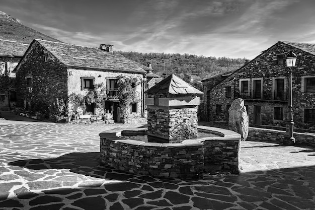 Photo old village with stone houses in the center of guadalajara spain black and white photo