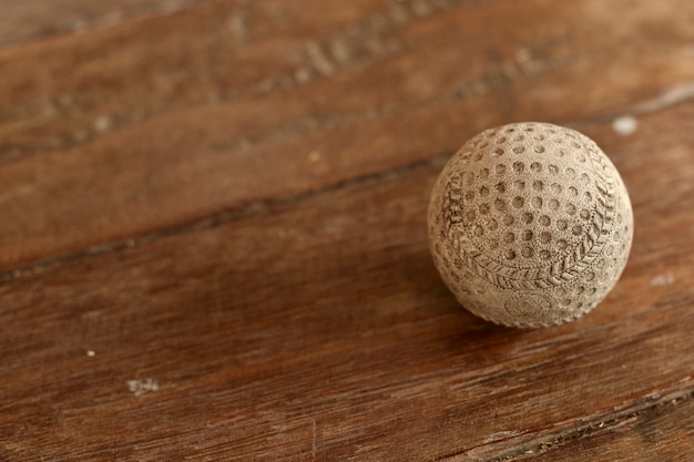 Old Vintage Baseball on wooden