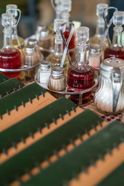 Old vintage glass bottles with condiments