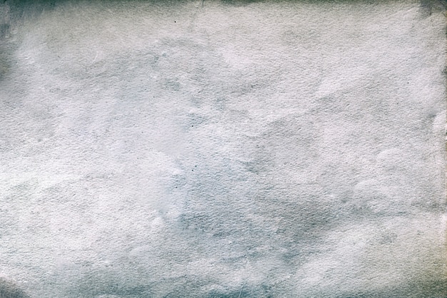 Old vintage paper background. Grungy paper texture.