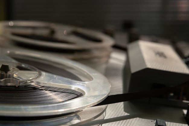 Old vintage reel-to-reel player. Tape recorder with spools. Bobbin tape recorder.