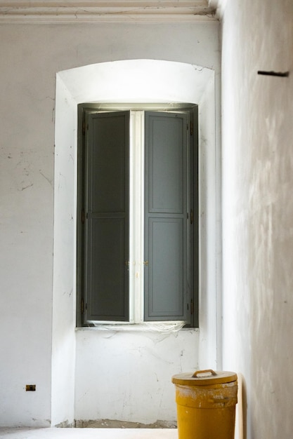 An old vintage window in a beautiful European architecture building