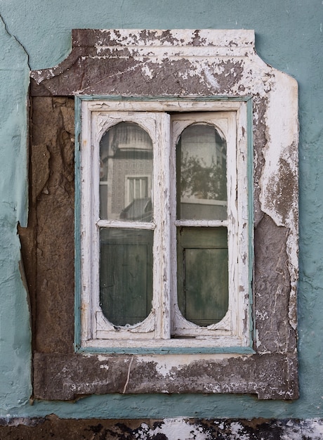 Old vintage window, the Portuguese abandoned house.