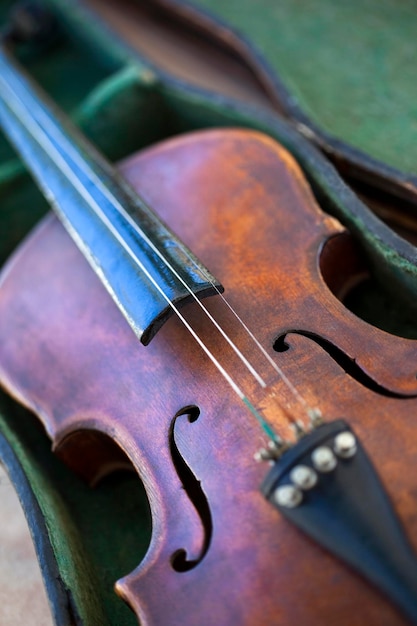 Old violin without a rope in a flea market