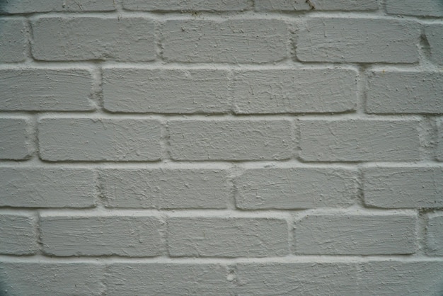 Old Wall Made Of Red Brick Painted White In Loft Style Backgro