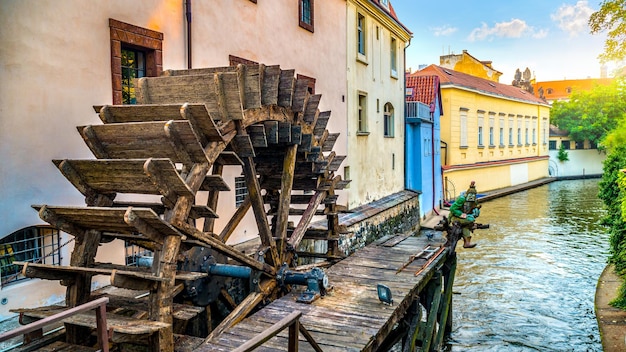 Old water mill in Prague at sunrise