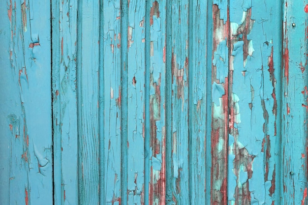 Old weathered board painted blue abstract background