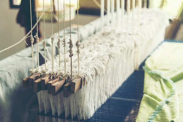 Old weaving loom - closeup - photo, vintage filter image