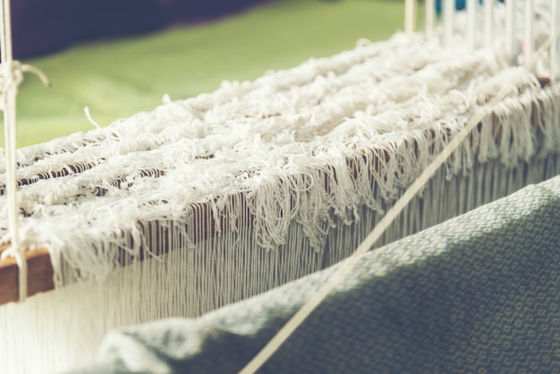 Old weaving loom - closeup - photo, vintage filter image