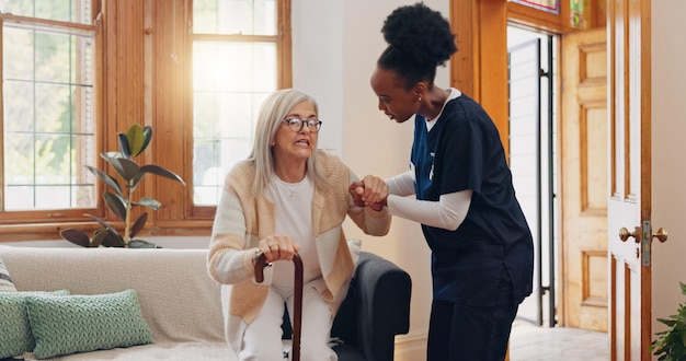 Photo old woman walking stick or caregiver in nursing home to help in retirement for medical support parkinson disabled or nurse holding hands of an elderly person in physical therapy rehabilitation