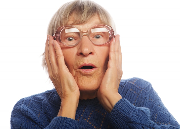 Old woman with surprised expression