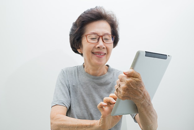 Old women with tablet,Senior Woman 