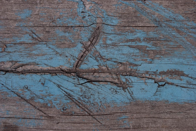 写真 仕事の亀裂や結び目の古い木材の背景