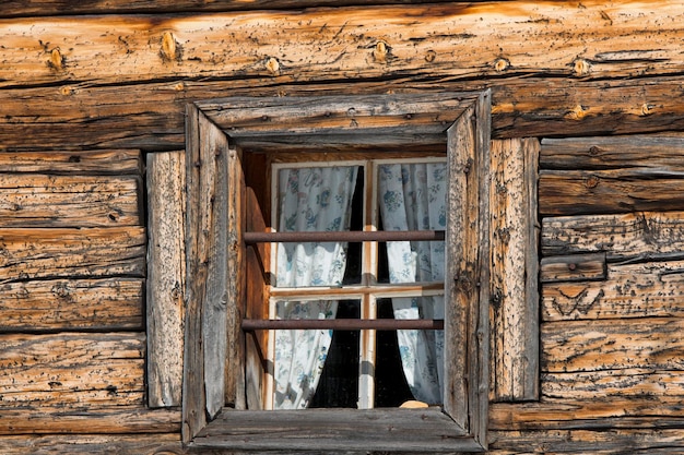 Old wood cabin house window