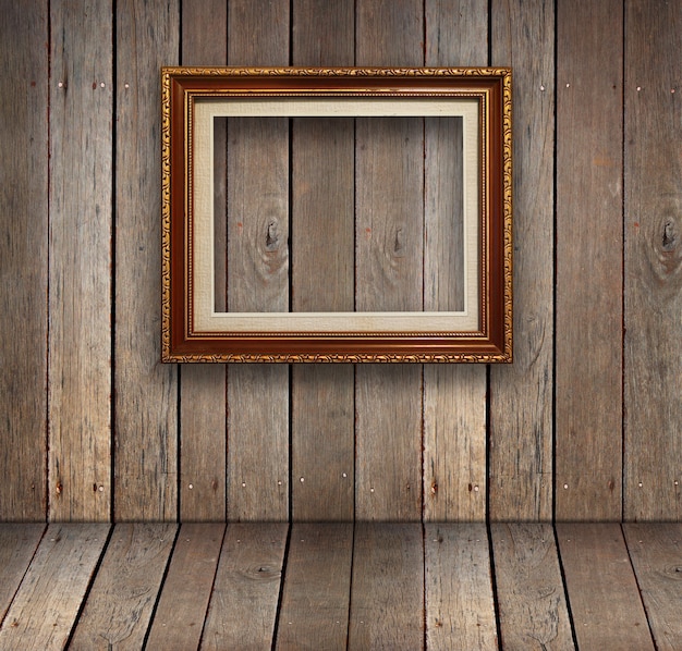 Old wood room with gold frame background.