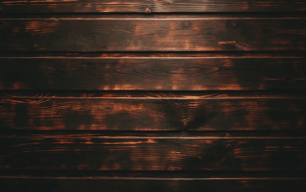 An old wood table burnt brown.